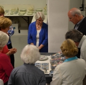 Viewing a selection of newly conserved Drayton porcelain objects that will in included in the exhibit.