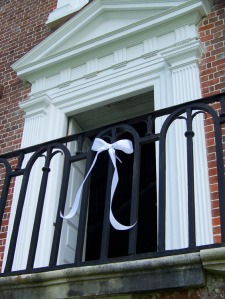 As a tribute to Philip Simmons, white ribbons adorn the ironwork he helped to shape, at Drayton Hall and throughout the area.